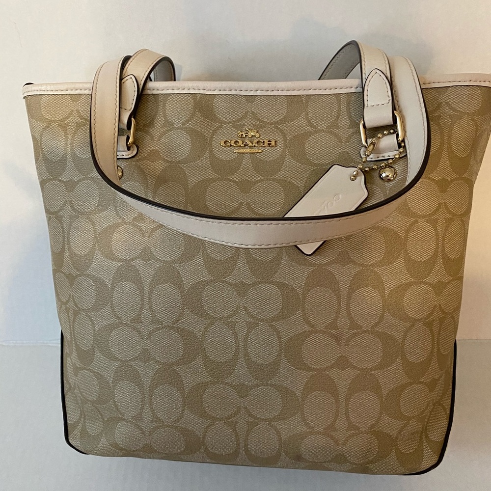 Tan Coach handbag with gold hardware
